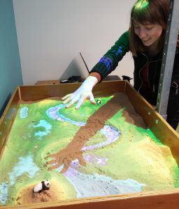 Elisa 'makes it rain' in the AR Sandbox