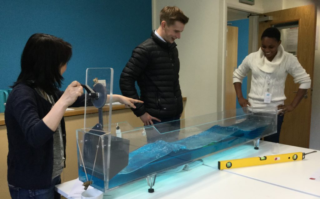 Students practice their wave tank demonstration skills 