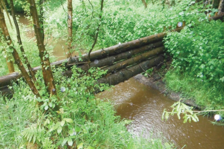 Leaky barrier retention times for Natural Flood Management interventions